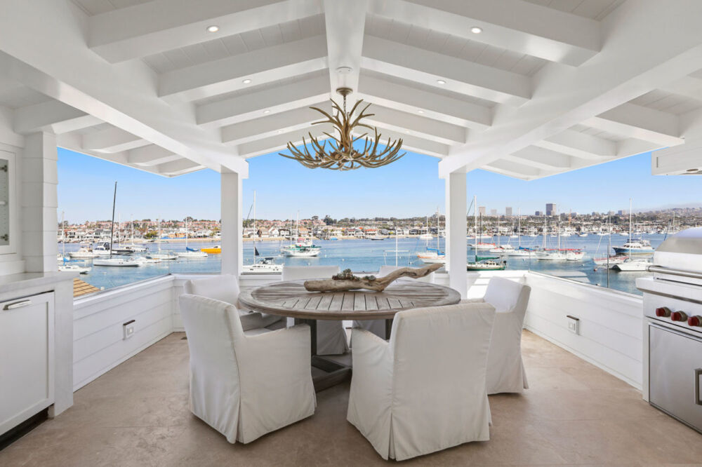 This former Wrigley Family beach house features classic elegance, custom millwork, and coffered ceilings. It was designed with high end finishes and fixtures on a casual palette. It features Statuarietto marble, Viking appliances, Rhol faucets throughout. We used neutral colors and luxury finishes so the owners could dress it up for plated dinners or host […]