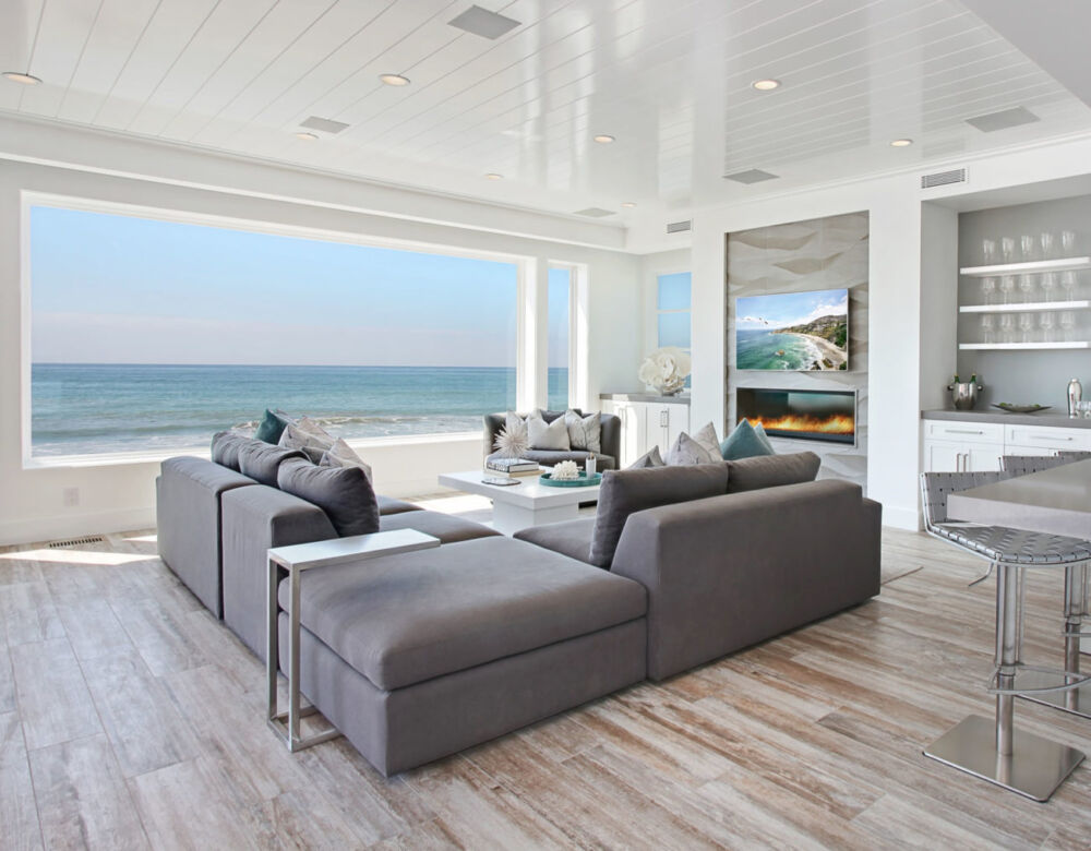 This coastal contemporary Beach retreat was designed with an open floor plan, modern finishings and west coast casual comforts. With 180 degree views of the pacific we chose to keep the ocean as the art and focus on the architectural details. This is evident in the staircase where the drywall and tiled stairs meet with […]